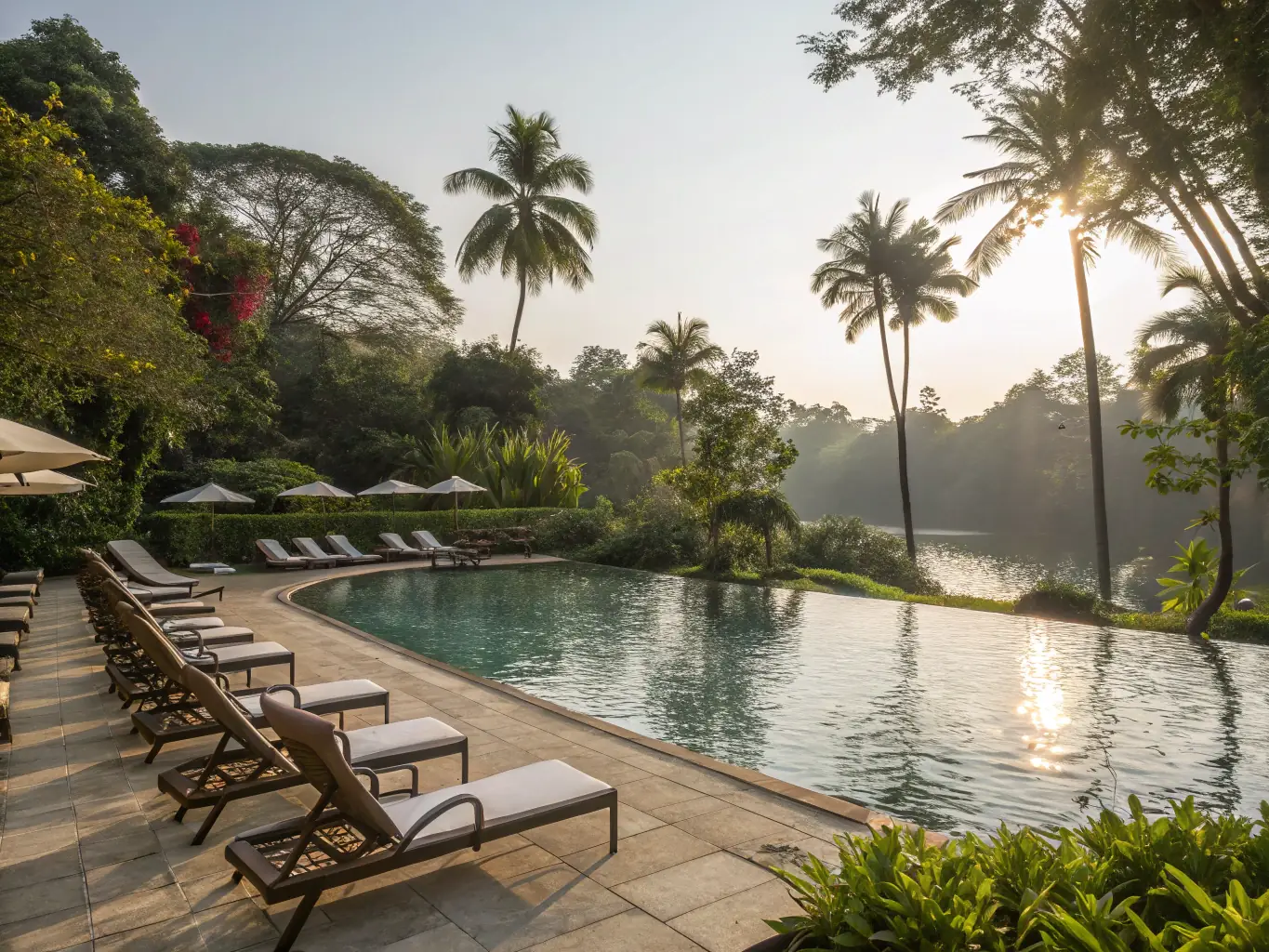 A vibrant image of the heated pool and spa area at Southport Tourist Park, showcasing guests relaxing and enjoying the water in a sunny, tropical setting.